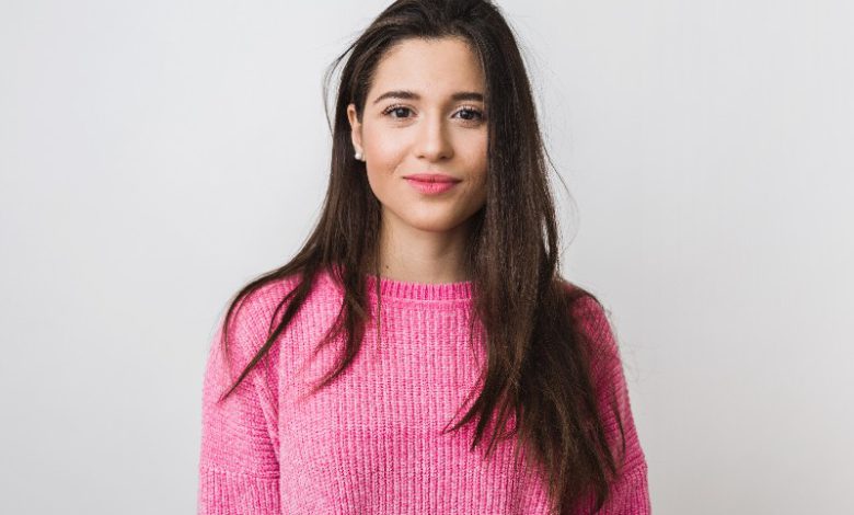 young beautiful woman pink warm sweater natural look smiling portrait isolated long hair copy 800x533