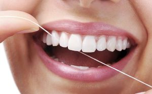 دندان عقل ، استفاده از نخ دندان برای مراقبت از دندان‌ها
